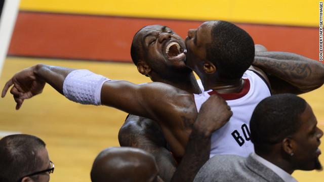 June 21: LeBron James of the Miami Heat celebrates with teammate Chris Bosh during the NBA Finals game between the Miami Heat and the Oklahoma City Thunder in Miami. The Heat won the series 4-1.