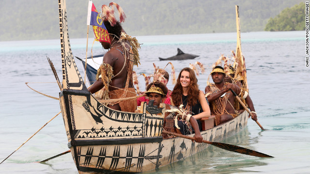 September 17: Catherine, Duchess of Cambridge, and Prince William, Duke of Cambridge, travel in a traditional canoe during a visit to Tavanipupu Island on their Diamond Jubilee tour of the Far East.