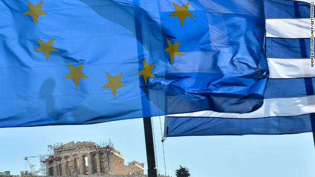 October 12: The European Union wins the Nobel Peace Prize while grappling with the worst crisis since its founding -- devastating debt and the threat of disintegration. The flag of the 27-nation union, left, flies alongside the flag of debt-ridden Greece in front of the Acropolis in central Athens.