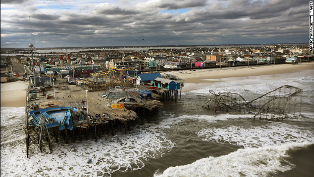 October 31: Waves break in front of a destroyed amusement park wrecked by Superstorm Sandy in Seaside Heights, New Jersey.