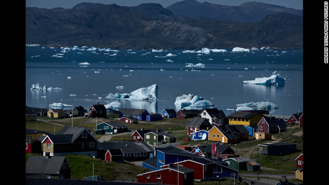 July 23: Icebergs from nearby glaciers float in the bay in Narsaq, Greenland.