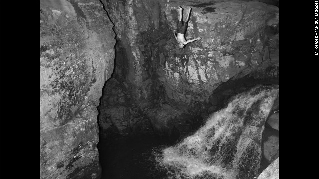 August 13: A man dives into the water near Kaaterskill Falls in the Catskill Mountains in the Hudson Valley.