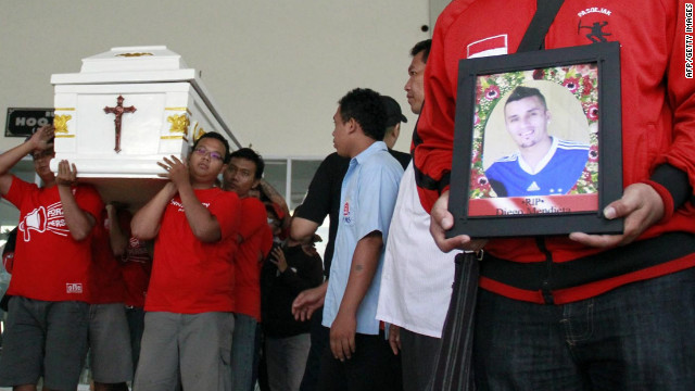 Diego Mendieta's former teammates carry his coffin at the Paraguayan footballer's funeral in Solo, Indonesia. 