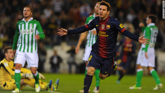 Lionel Messi celebrates after matching Gerd Muller's record of 85 goals in a calendar year, netting in the 16th minute of Barcelona's match against Real Betis. Just nine minutes later the Argentina star passed the German's 1972 milestone. 