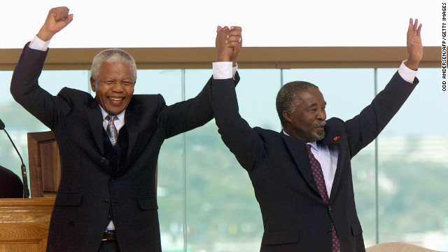 After one term as president, Mandela stepped down. Thabo Mvuyelwa Mbeki, at right, was sworn in as his replacement in June 1999.