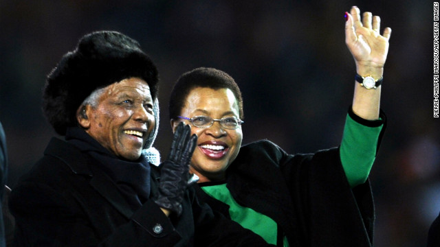 Nelson Mandela and his third wife, Graca Machel, arrive at the 2010 World Cup before the final match between Netherlands and Spain on July 11, 2010, at Soccer City Stadium in Soweto.