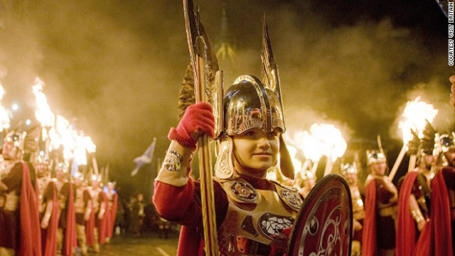 Edinburgh's annual New Year's Eve (Hogmanay) festivities are cast aglow with a torchlight procession involving more than 25,000 locals. The parade is led by Shetland's Up Helly Aa vikings (pictured).