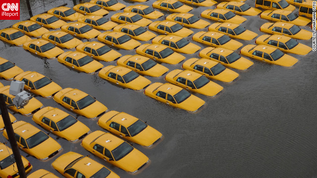 A fleet of taxi cabs sat submerged in a flooded parking lot in Hoboken, New Jersey, after Superstorm Sandy hit the area in October. Photographer Jonathan Otto said, "The picture was taken from the 14th street viaduct looking over the corner of Jefferson and 14th street, where it appears New York stores new cabs."