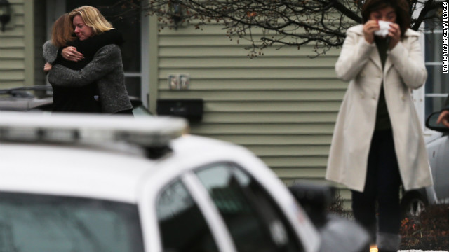 Mourners leave Honan Funeral Home after attending the funeral for Jack Pinto, 6, on Monday, December 17, in Newtown. 