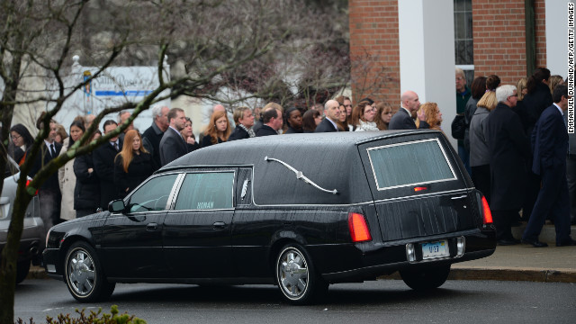 Jessica Rekos' casket arrives at St. Rose of Lima Roman Catholic Church as mourners gather December 18.
