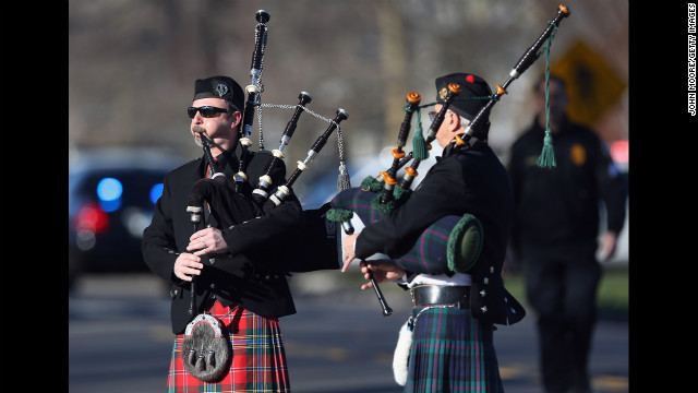 Bagpipers play at funeral services for Soto on December 19 in Stratford.