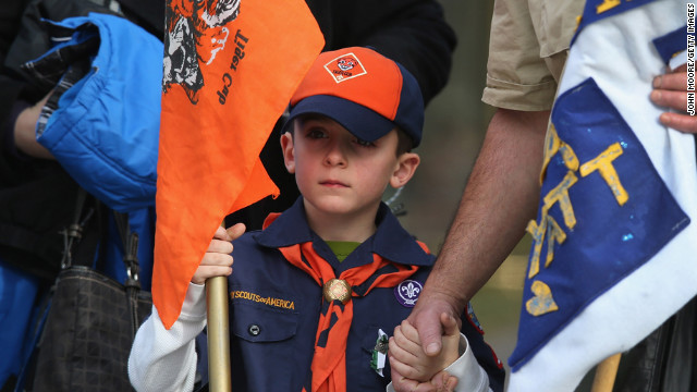 Mourners, including Boy Scout and Tiger Scout members, depart the funeral on December 20, 2012. Wheeler was a member of Tiger Scout Den 6.