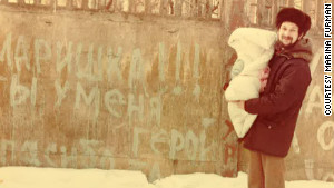 Unable to see his sick wife for a week after she gave birth, Lev Furman painted a message on a wall outside the hospital.