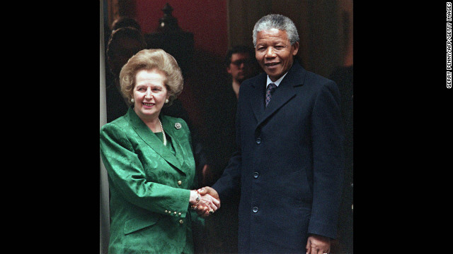 Thatcher greets Nelson Mandela on the steps of 10 Downing Street in July 1990. The anti-apartheid activist and future South African president had been freed that year after more than 25 years as political prisoner.