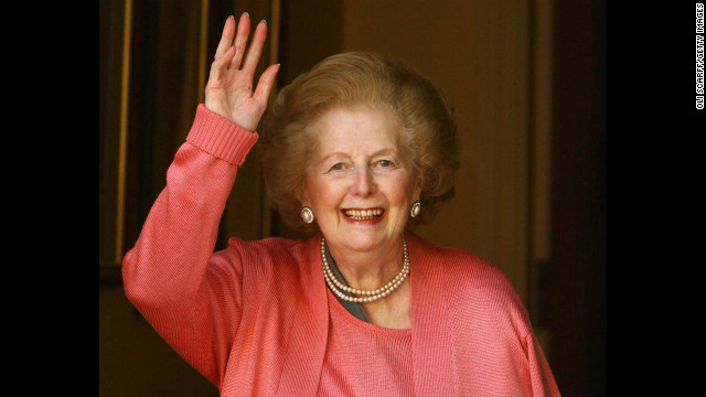Thatcher waves from the door of her London home after a hospital stay to operate on a broken arm in June 2009. She had a pin placed in her shoulder after suffering a fall.