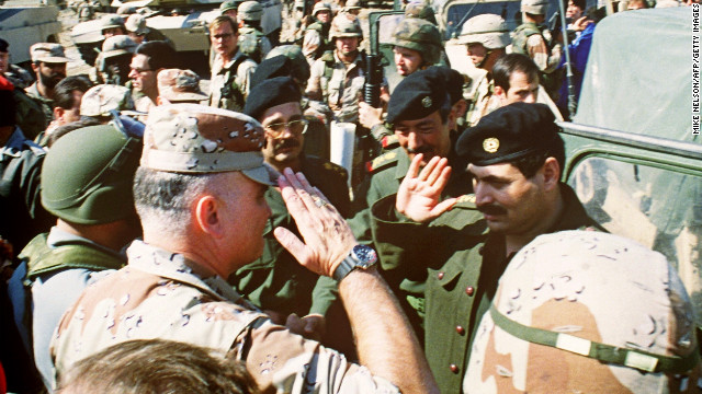 Schwarzkopf salutes Iraqi Lt. Gen. Sultan Hashim Ahmad at the end of their talks to set cease-fire terms in the Gulf War on March 3, 1991, at a captured Iraqi air base.