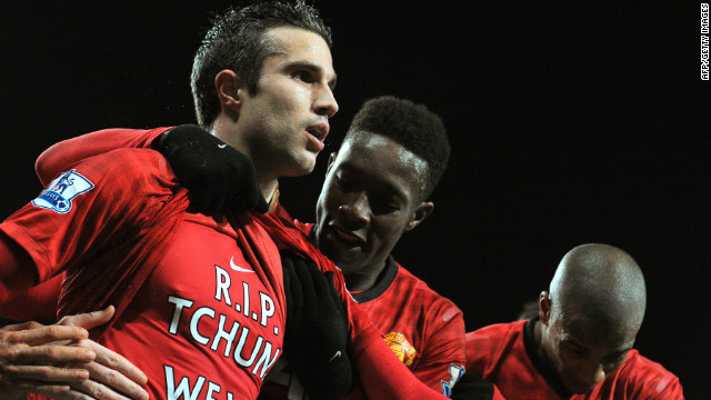 Substitute Robin van Persie (L) celebrates after sealing Manchester United's 2-0 win over with West Brom, scoring his 14th league goal this season.