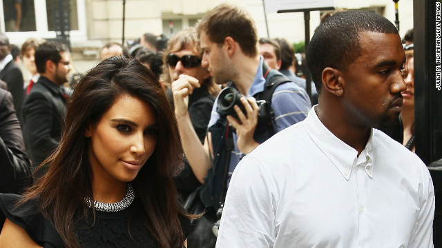 The couple love European cities and their baby was reportedly conceived near the Vatican in Rome. Here they leave the Valentino Haute-Couture Show as part of Paris Fashion Week in 2012. Paris or Rome West maybe?