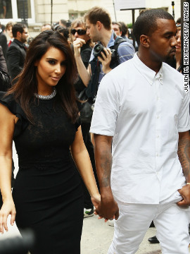 In July 2012, Kim and Kanye kept one another close as they exited the Valentino Haute-Couture Show during Paris Fashion Week.