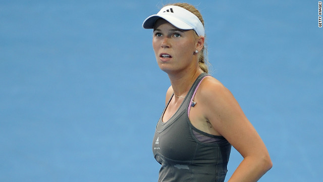 Caroline Wozniacki slips to defeat against qualifier Ksenia Pervak in the first round of the Brisbane International.