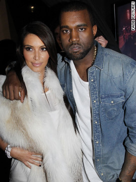 In March, a month <a href='http://marquee.blogs.cnn.com/2012/04/05/kanye-admits-he-fell-in-love-with-kim-k-in-song/' >before Kanye told the world he "fell in love with Kim" in a new song</a>, the pair were seen embracing at his Fall/Winter 2012 fashion show in Paris. 