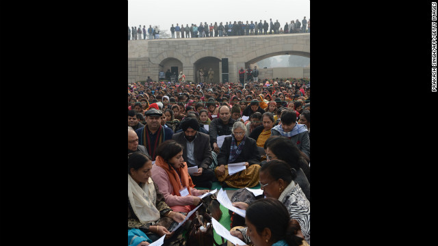 Delhi Chief Minister Sheila Dikshit, center, participates in a group prayer during the Women's Dignity March on January 2.