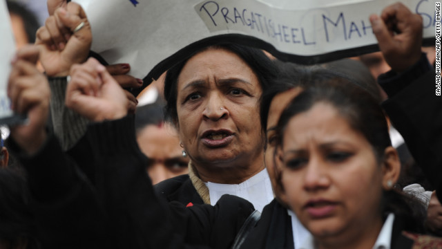 Indian lawyers shout during a protest at the entrance to Saket District Court in New Delhi on Thursday, January 3.