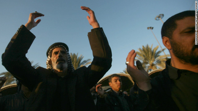 Shiite Muslim pilgrims take part in the Arbaeen rituals in the shrine city of Karbala, Iraq on January 2, 2013.