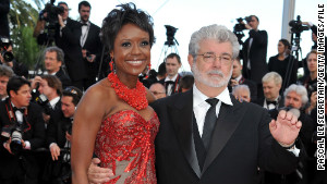 George Lucas, here with fiancee Mellody Hobson, has given Abrams his stamp of approval.