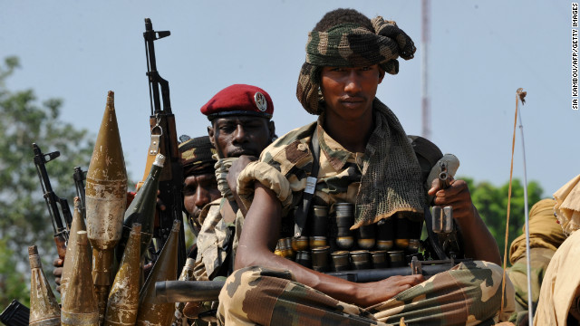 Chadian soldiers, part of a convoy of the FOMAC multinational force of central African states, near Damara on January 2, 2013.