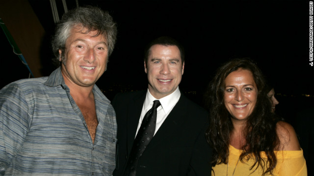 Vittorio Missoni and his sister, Angela, pose with actor John Travolta at the Venice Film Festival in 2004.