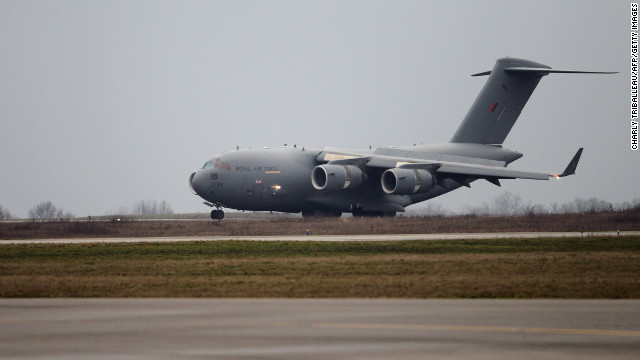 A British army Boeing C-17 cargo plane from British Brize Norton base lands Sunday at the Evreux military base in France to take supplies to Bamako. 