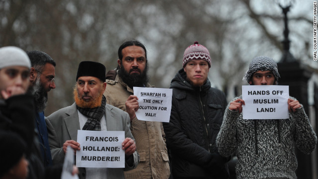 Muslim men protest French military action in Mali outside the French Embassy in central London on Saturday, January 12. About 50 Muslim protesters gathered outside the embassy.