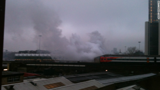 Smoke billows over central London's Vauxhall Cross area after a helicopter crash on the morning of January 16.