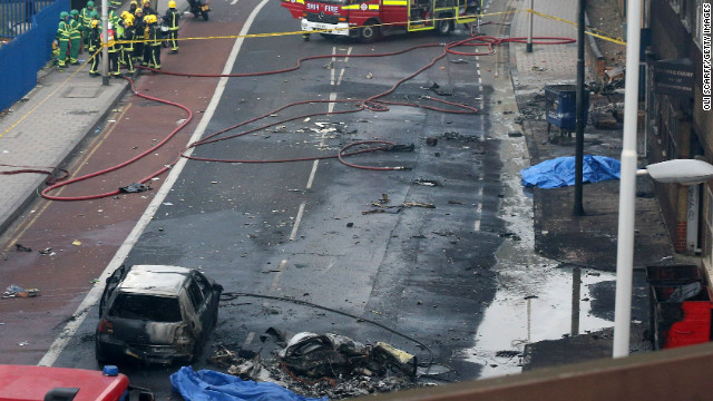 Emergency services at the scene after a helicopter reportedly collided with a crane attached to St Georges Wharf Tower in Vauxhall.