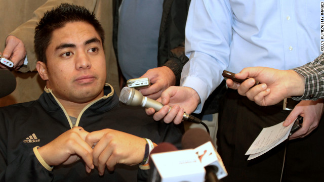 Te'o, a Heisman Trophy finalist, answers questions from reporters during an informal news gathering at the Marriott Marquis Hotel on December 7, 2012, in New York City a day before the presentation of the winner. 