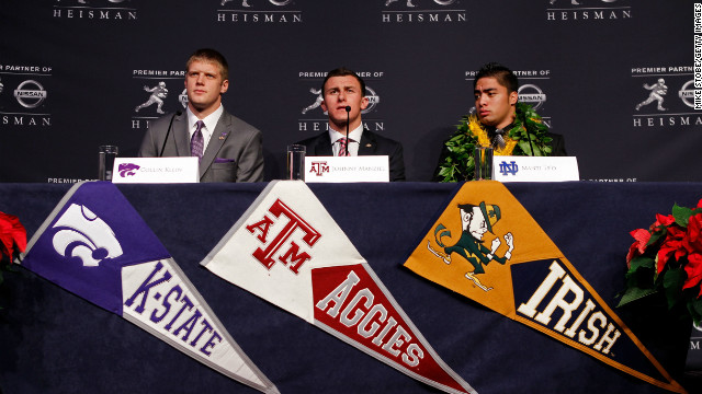 Heisman finalists quarterback Collin Klein, left, of the Kansas State Wildcats, quarterback Johnny Manziel, center, of the Texas A&M University Aggies and linebacker Te'o speak during a news conference before the 78th Heisman Trophy Presentation at the Marriott Marquis on December 8, 2012, in New York City.