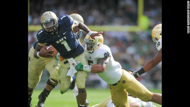 Te'o tackles Trey Miller of Navy during their game in Dublin, Ireland, on September 1, 2012.