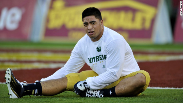 Te'o stretches on November 24, when the Fighting Irish defeated the USC Trojans 22-13 in Los Angeles.