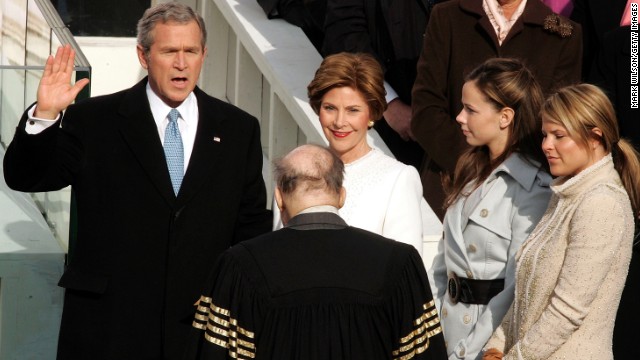 George W. Bush stands next to his wife, Laura, and his two daughters at his second inauguration on January 20, 2005.