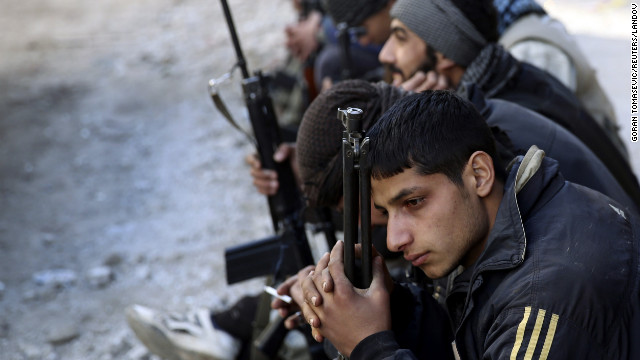 Free Syrian Army fighters rest in Mleha suburb in Damascus on January 17. 