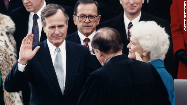 Chief Justice William Rehnquist administers the oath of office to President George H. W. Bush on January 20, 1989. 