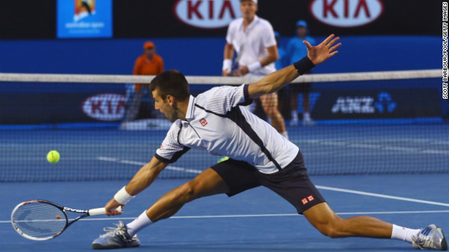 Novak Djokovic of Serbia stretches for the ball in his quarterfinal match against Tomas Berdych of the Czech Republic on Day Nine of the 2013 Australian Open in Melbourne on Tuesday, January 22. Djokovic won 6-1, 4-6, 6-1, 6-4. The two-week tennis tournament continues through Sunday, January 27. 