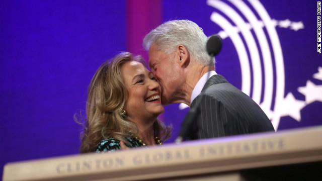 Former U.S. President Bill Clinton kisses his wife after introducing her at the Clinton Global Initiative annual meeting on September 24, 2012 in New York City. 