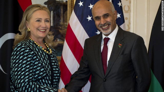 Clinton shakes hands with Libyan President Mohamed Magariaf on September 24, 2012 in New York. 