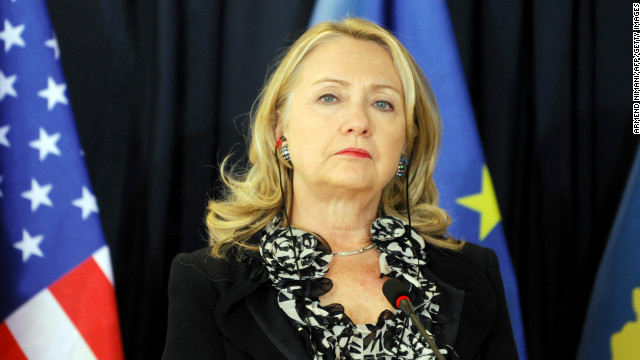 Clinton stands during a press conference following meetings at the Prime Minister's Office in Pristina, Kosovo, on October 31, 2012. Clinton said that Kosovo's unilaterally declared independence, fiercely opposed by Serbia, was 'not up for discussion'. 