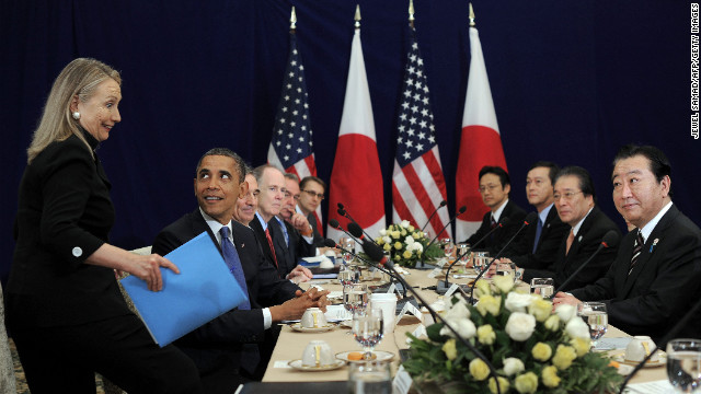 President Barack Obama looks at Clinton before the start of a bilateral meeting with Japanese Prime Minister Yoshihiko Noda, far right, during the East Asian Summit at the Peace Palace in Phnom Penh, Cambodia, on November 20, 2012. 