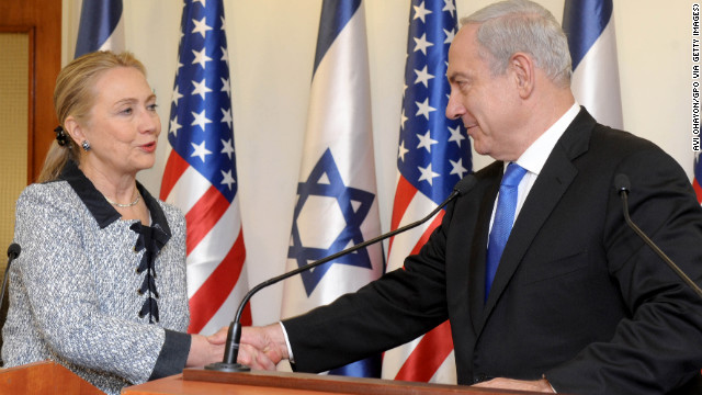 Israeli Prime Minister Benjamin Netanyahu shakes hands with Clinton at the prime minister's office November 20, 2012 in Jerusalem, Israel. Clinton arrived in Israel as efforts by Western and Arab diplomats to end the confrontation between Israel and Gaza have escalated. 