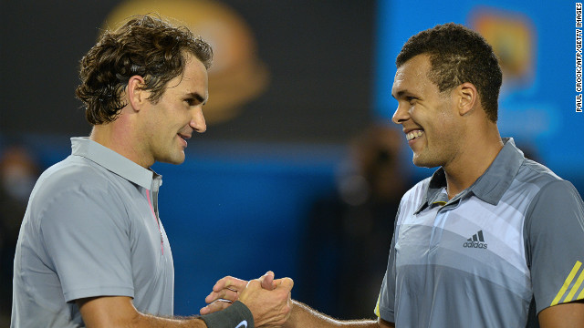 Roger Federer (left) and Jo-Wilfried Tsonga shake hands after their five-set quarterfinal match at the Australian Open.