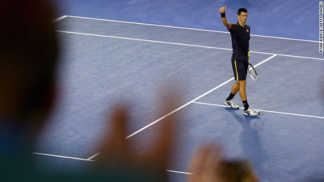 Novak Djokovic of Serbia celebrates winning his semifinal match against David Ferrer of Spain during the Australian Open in Melbourne on Thursday, January 24. Djokovic won 6-2, 6-2, 6-1. The two-week tennis tournament continues through Sunday, January 27. 